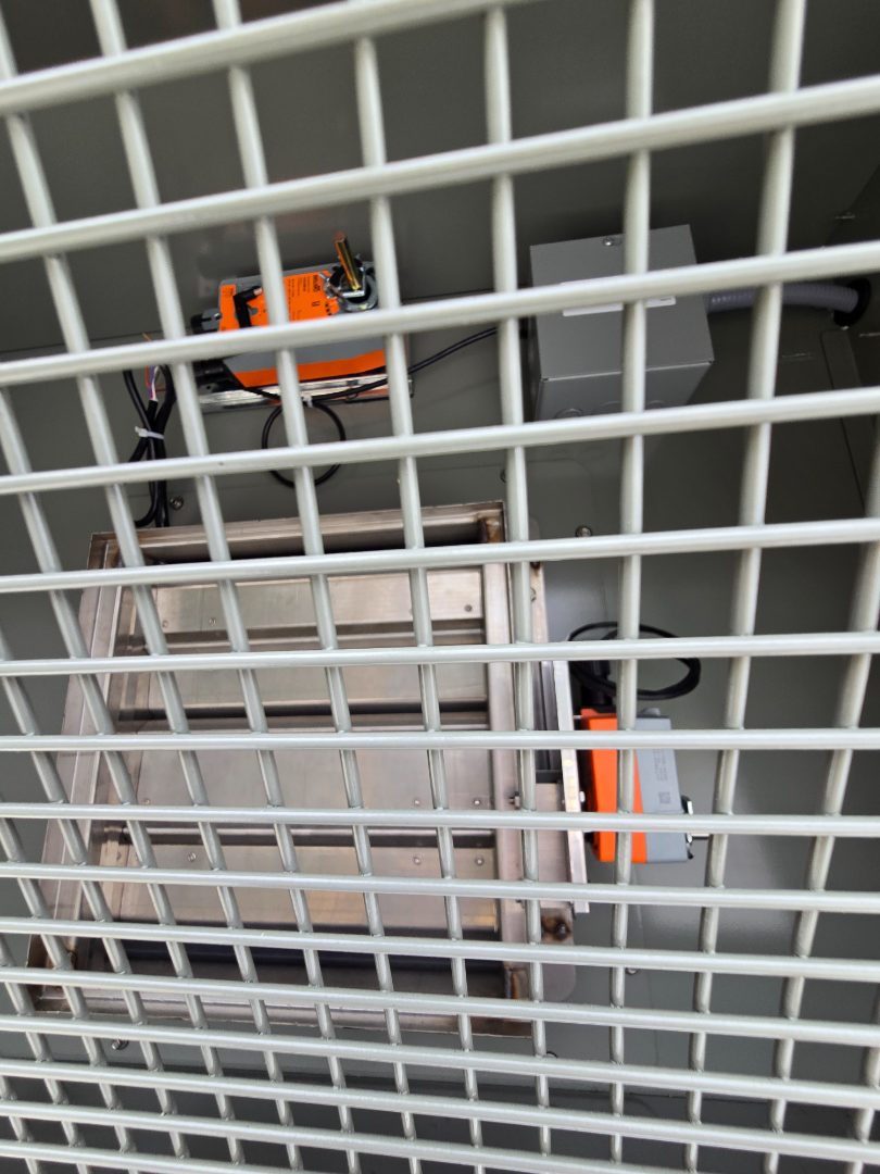 A close view of a louvre face and bird screen on a new unit